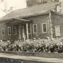 Robert Galbraith on steps of the Priory, Guelph, photograph, ca. 1920.