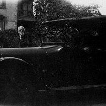 Men with parked car in Mount Forest, photograph, ca. 1910.