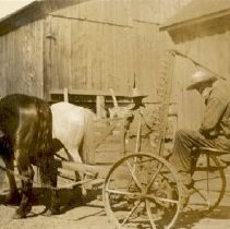 ph 19257 Harry Lockhart with mower 1930s
