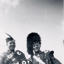 Piper and drummer in highland costume, Fergus Highland Games ca. 1950