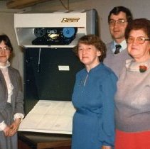 Presentation of microfilm reader to Archivist, Bonnie Callen, Dec. 1983