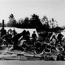 Men with horses and wire in front of a tent near Clifford, ca.1886