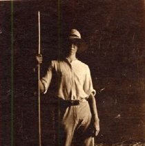 ph 16115: Man, standing, holding pole [Grange?].