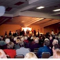 Crowd and stage at volunteer awards,2004.