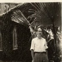 ph 5833: man by church, ca. 1930.