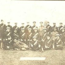 Members of 30th Wellington Rifles standing in front of a military tent, photograph, ca. 1905.