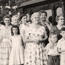 PH 23720 Women and children standing in front of hearse. ca.1963-1964