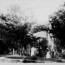 In front of John Prain's frame house, Harriston, ca.1910.