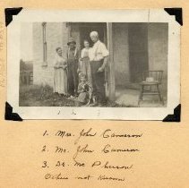 Mr. and Mrs. John Cameron, Dr. McPherson, with woman and child, ca. 1920