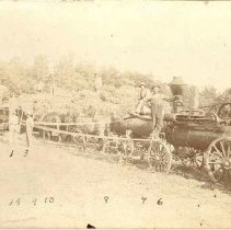 Group of men standing by horse drawn steam engine threshing machine, Concession 2 Lot 12, Puslinch Twp., July 1898.