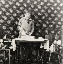Hilda Hockridge, pouring tea with dolls, 1927