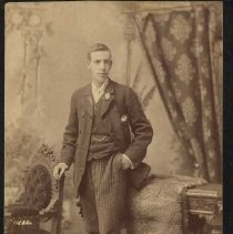 Man wearing suit with striped trousers related to Wilson and McQueen families of Fergus, ca. 1890