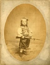 Child Holding Gun