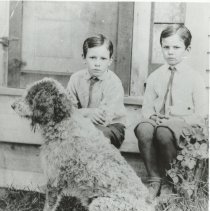 Lawrence and Edwin Roberts with egg-sucking dog.