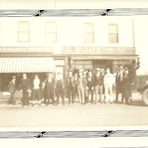 Willard Square businesses with people standing in front