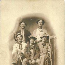 Photo postcard of five men in hiking clothes, includes William Dow