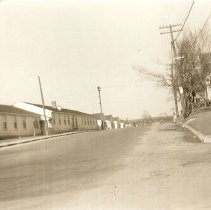 Looking east on Broadway, Cushing Village on left