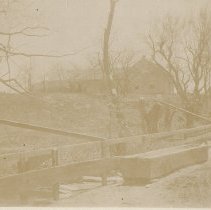 Unidentified house with watering trough