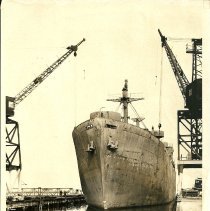 Liberty ship entering a basin at the former East Yard to be scrapped, 1959
