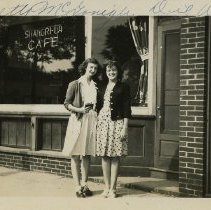 Betty McGonigle and Dil Whitmore in front of the Shangri-La Cafe