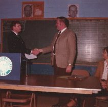 Bob Ganley congratulates Dick Miller