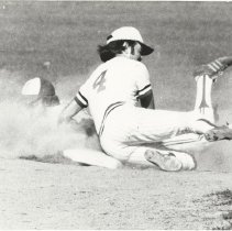 Al Livingston sliding into base