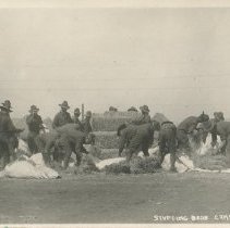 Kearny Photo 28-16.  Stuffing Beds Camp Kearny