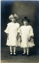 Two Girls in White Dresses