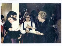 Photographic print of three women and a girl