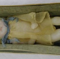 Wax baby doll