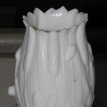 Vase with disembodied hand