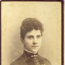 Young woman with dark curly hair