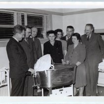 A group of people in the delivery room of Midland Hospital