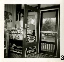 Inside of drugstore with front door open