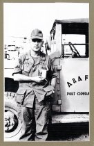 John Bird Posing Next to Jeep