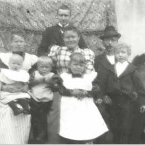 Group of four adults and four children