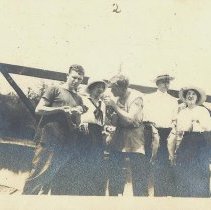 Group with fish and fishing poles