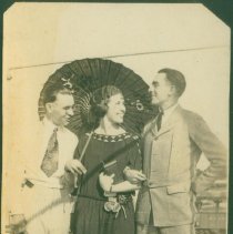 Alice, Tom, and another man.