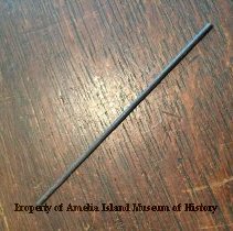 Metal rod in sextant case