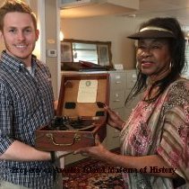 Annette Myers presenting sextant to Gray Edenfield