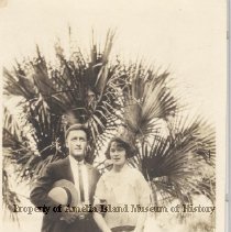 Gus and Azilda in front of a Palm Tree