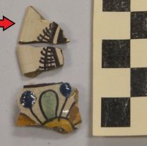 black patterned glazed potsherd