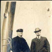 two unidentified men on ship