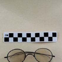 wire-rimmed spectacles (tinted lens)