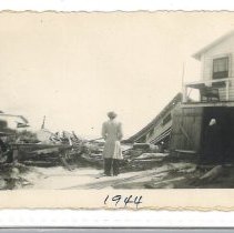 Photograph of Lucile Dixon Bennett facing 1944 Fernandina Hurricane Damage