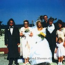 Unknown wedding couple on beach