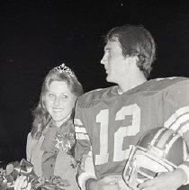 Homecoming Queen and Escort
"Randa Gowen" Award

FBHS Cheerleaders and Trophies

Orange Hall-- St. Mary's

Handwritten Sign/ Message
Mill