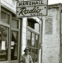 Marshall Radio TV Service
Woman with Bottle at Old House; date unknown

Main Beach