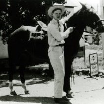 S2003.104 Don Nelson outside Sinton's and Smiths Grocery Store 1801 Cheyenn
