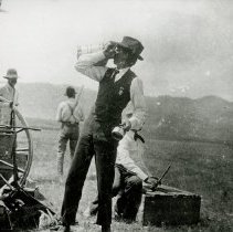 S999.211 Man Drinking From Jug